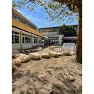 Cr&eacute;ation d'un espace paysager naturel avec blocs rocheux