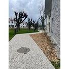 Installation d'un rev&ecirc;tement b&eacute;ton d&eacute;sactiv&eacute;