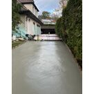 Application du d&eacute;sactivant sur la dalle en b&eacute;ton